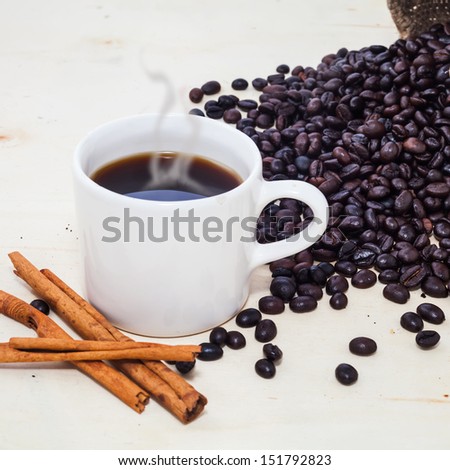 hot coffee and raw coffee bean
