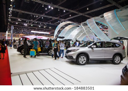 NONTHABURI - March 26: Unidentified people interesting with Toyota boot at The 35th Bangkok International Motor Show on March 26, 2014 in  Nonthaburi, Thailand.