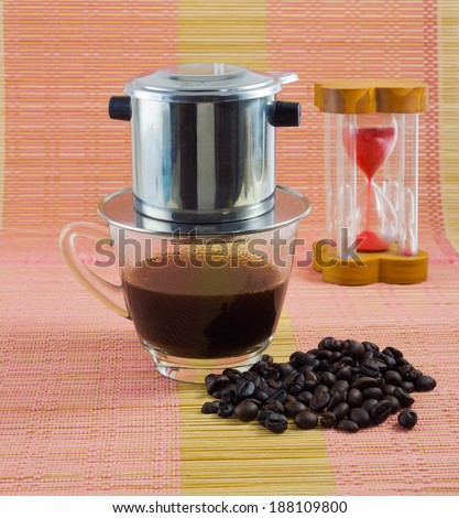Coffee maker Vietnam style and roasted coffee beans