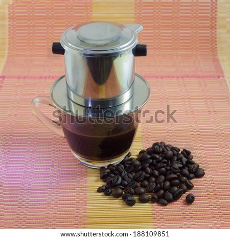 Coffee maker Vietnam style and roasted coffee beans