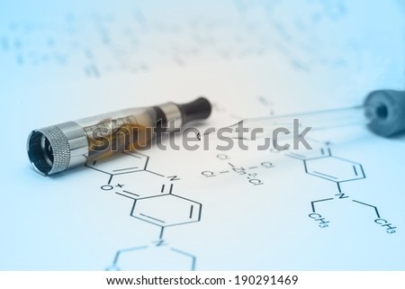 Laboratory Glass Pipette and E-cigarette