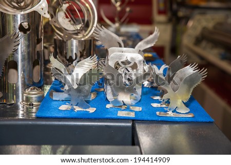 BANGKOK ,THAILAND - MAY 18:The object was cutted by Laser cutting   ASEAN\'s Leading Industrial Machinery and Subcontracting  Exhibition 2014,on May 18, 2014 in Bangkok, Thailand.