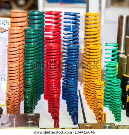 BANGKOK ,THAILAND - MAY 18:industrial springs suspension in red,  green ASEAN\'s Leading Industrial Machinery and Subcontracting  Exhibition 2014,on May 18, 2014 in Bangkok, Thailand.