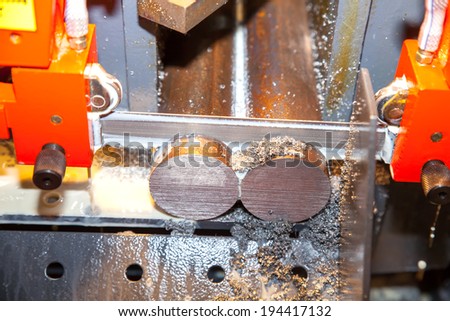 BANGKOK ,THAILAND - MAY 18:industrial band-saw cutting a steel  ASEAN\'s Leading Industrial Machinery and Subcontracting  Exhibition 2014,on May 18, 2014 in Bangkok, Thailand.