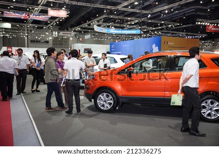 BANGKOK - AUGUST 16 :Unidentified people interesting with Ford car at Big Motor Sale 2014 on June 28,2014 in BITEC ,Bangkok, Thailand.
