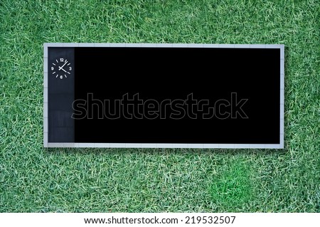 score board on green grass background