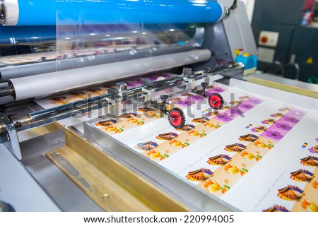 BANGKOK - SEPTEMBER 27 :Plastic coating on paper machines display at GASMA PRINT 2014 on Sep 27,2014 in BITEC ,Bangkok, Thailand.