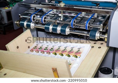 BANGKOK - SEPTEMBER 27 :Print media from printing  machines display at GASMA PRINT 2014 on Sep  27,2014 in BITEC ,Bangkok, Thailand.
