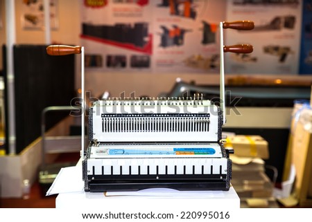BANGKOK - SEPTEMBER 27 :Old manual binder  machines display at GASMA PRINT 2014 on Sep  27,2014 in BITEC ,Bangkok, Thailand.