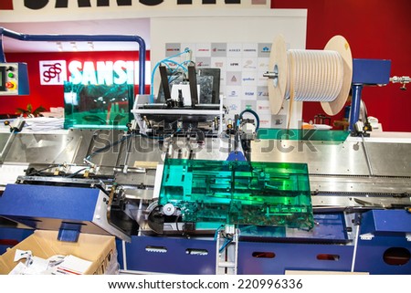 BANGKOK - SEPTEMBER 27 :Calendar desk binder  machines display at GASMA PRINT 2014 on Sep  27,2014 in BITEC ,Bangkok, Thailand.