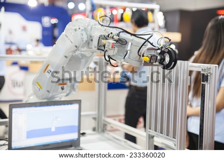 BANGKOK - NOVEMBER 22 :An industrial robot hands display at METALEX 2014 on Nov 22,2014 in BITEC ,Bangkok, Thailand.