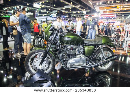 NONTHABURI - DECEMBER 4 :TRIUMPH Thruxton 900  motorcycle  on display at MOTOR EXPO 2014 on  Dec 4,2014 in Nonthaburi, Thailand.