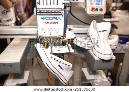 BANGKOK ,THAILAND - FEBRUARY 7: Shoes on embroidery machine at THAILAND  Industrial Fair 2015 And Food Pack Asia 2015 on February 7, 2015 in  Bangkok, Thailand.