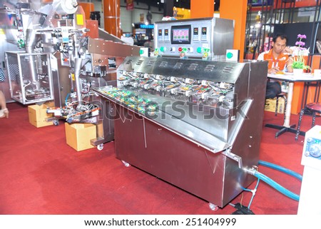 BANGKOK ,THAILAND - FEBRUARY 7: Food packaging machine At THAILAND  Industrial Fair 2015 And Food Pack Asia 2015 on February 7, 2015 in  Bangkok, Thailand.