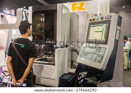 BANGKOK ,THAILAND - MAY 16: Unidentified people interesting with  controler machine box in Intermach-Subcon Thailand 2015, on MAY 16, 2015 in Bangkok, Thailand.