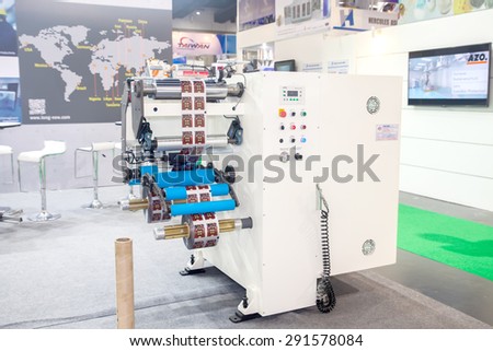 BANGKOK ,THAILAND - JUNE 20: printing logo plastic packaging 
machine in PROPAK ASIA 2015, on JUNE 20, 2015 in Bangkok, 
Thailand.