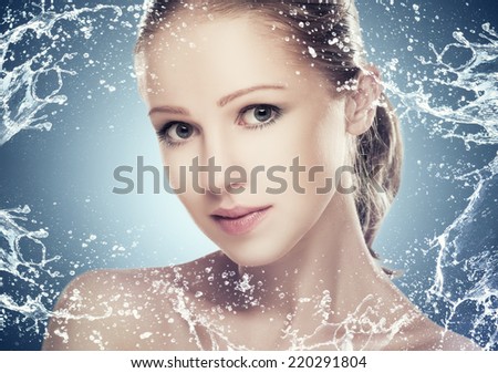 concept beauty skin care, face of a beautiful girl with splashes and drops of water