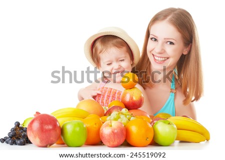 happy family mother and daughter little girl, eat healthy vegetarian food, lots of fruit isolated