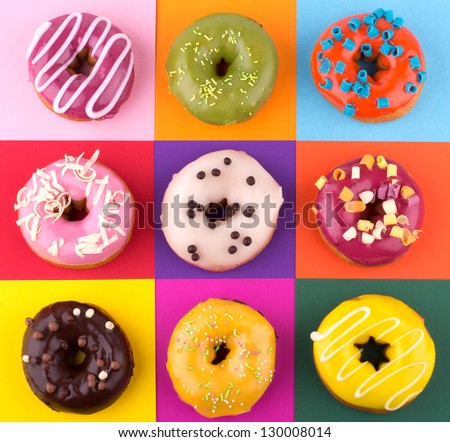 Donuts isolated on colorful background