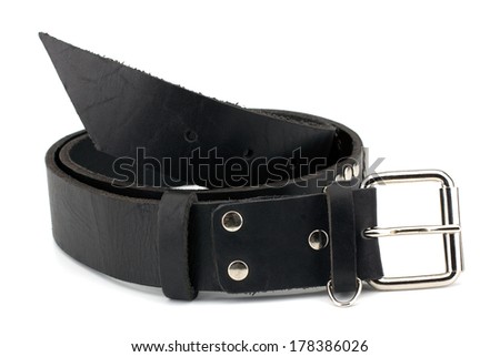 Rock style leather belt and bracelet isolated on white background