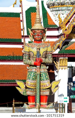 Red demon gate guardian at Wat Pra Kaew, Thailand