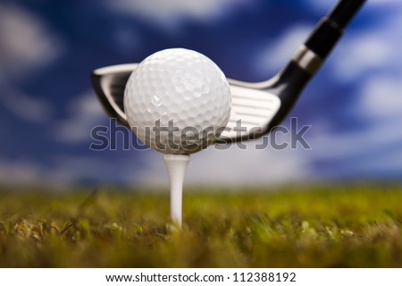 Playing golf, ball on tee