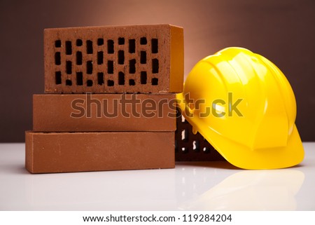 Brick, yellow hard hat