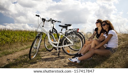 Girl with a bicycle enjoying
