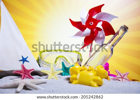 Toy windmill and beach accesories