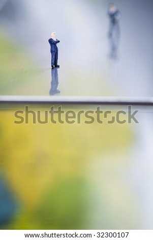 Figure man over computer background