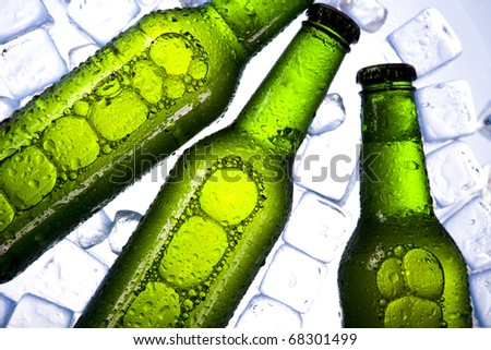 Bottles Of Beer, Three fresh beer with ice