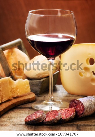red wine with dairy products and salami