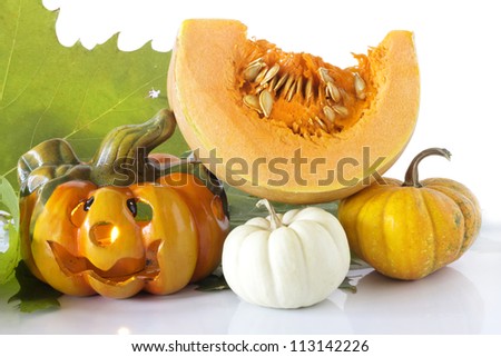 halloween pumpkin with decorative pumpkins