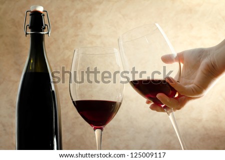 toast with red wine glasses