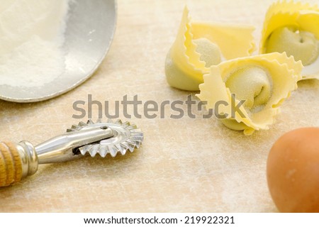 home made ravioli with ingredients and tool