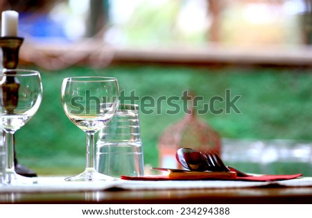 restaurant table setting over colorful background