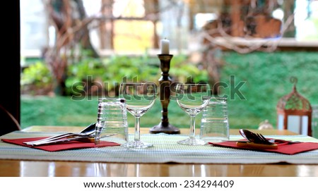 romantic setting for restaurant table for two