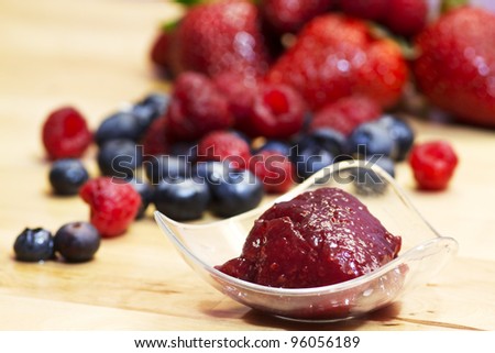 red fruits marmalade with fruits background