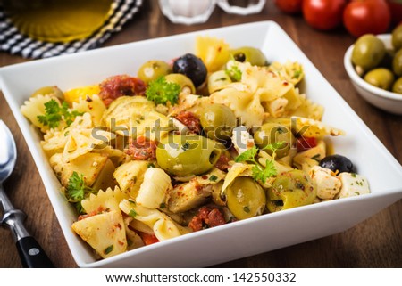 Mediterranean pasta salad with mixed pickled veggies.