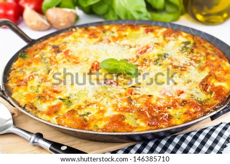 Italian frittata with vegetables and parmesan cheese