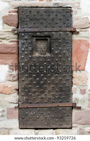 Very old wooden door of a historical building