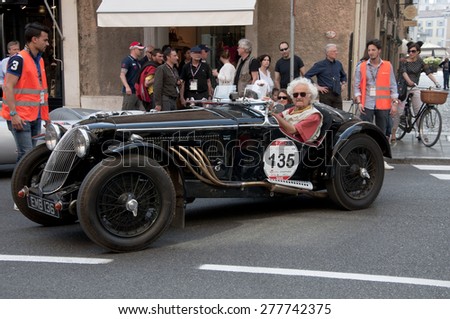 BRESCIA,ITALY - MAY,13:Registration of participants of the famous race retro cars Mille Miglia, May 13,2015 in Brescia,Italy. Driver Bob Meijer on RILEY Sprite RAC Rally, 1938 built