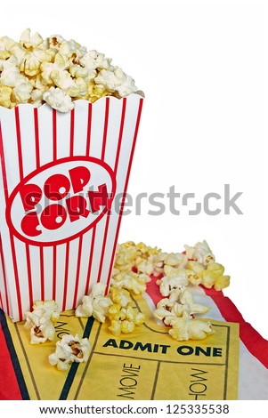 movie tickets on napkin with buttery popcorn in a striped box