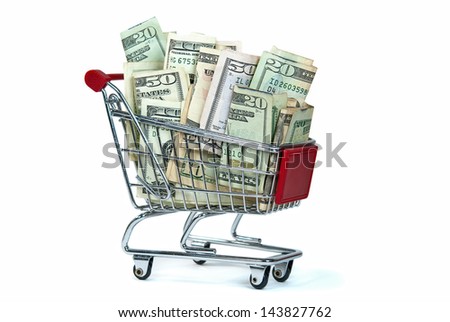 shopping cart filled with cash isolated on white
