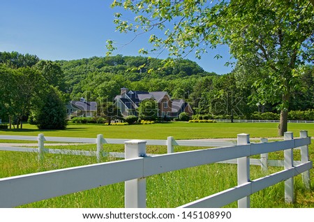 country estate with white fence