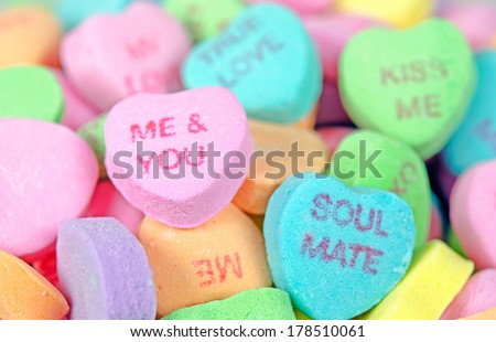 close up of colorful valentine candy hearts