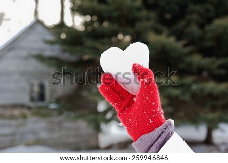 ice heart in a red glove