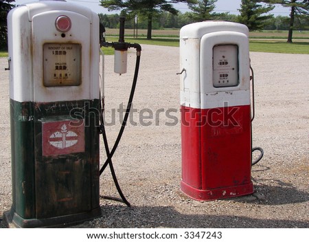 Old rusty gasoline pumps on a farm