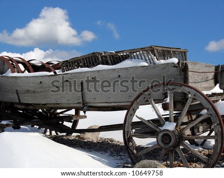 old wagon in snow