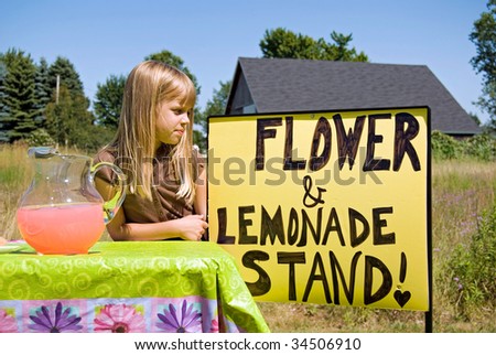 little girl with her lemonade stand